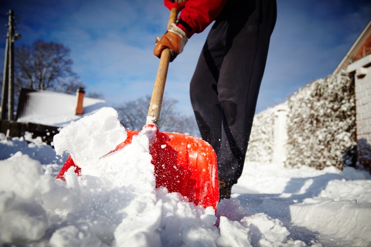 Using a shovel to clear up the snow in your backyard can cause back pain and muscle strain