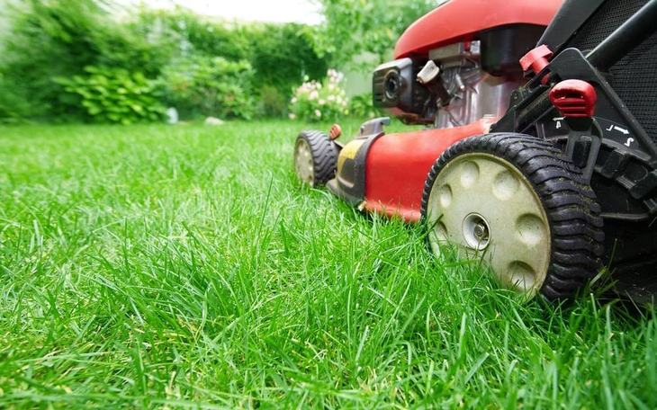 A rear-engine riding mower is designed for mowing