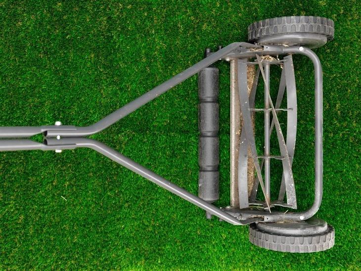 A reel mower with height adjustment helps you mow bermuda grass with ease