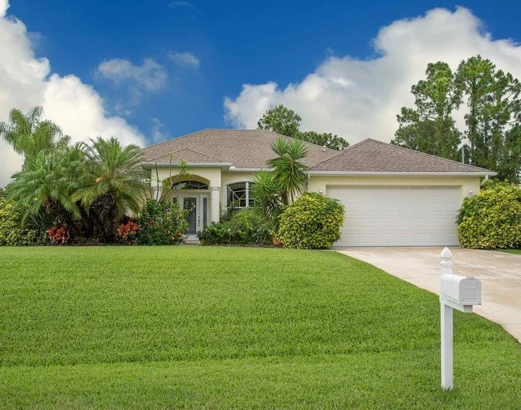 A healthy lawn covered in green, healthy, “good” lawn grass