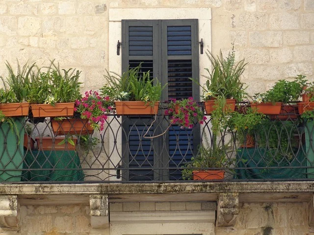 balcony with plant box and square foot garden spacing