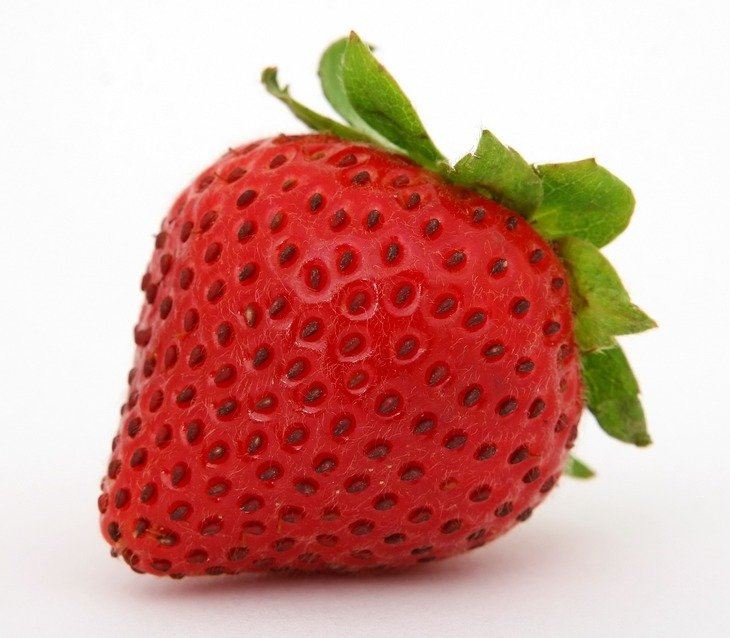 The strawberries’ seeds are the brown dots outside the fruit