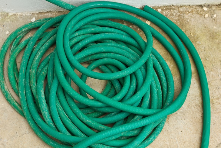 Use old garden hose like this one to create your soaker hose