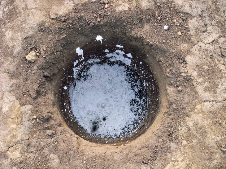 With a post hole digger, making holes such as this one is relatively easy